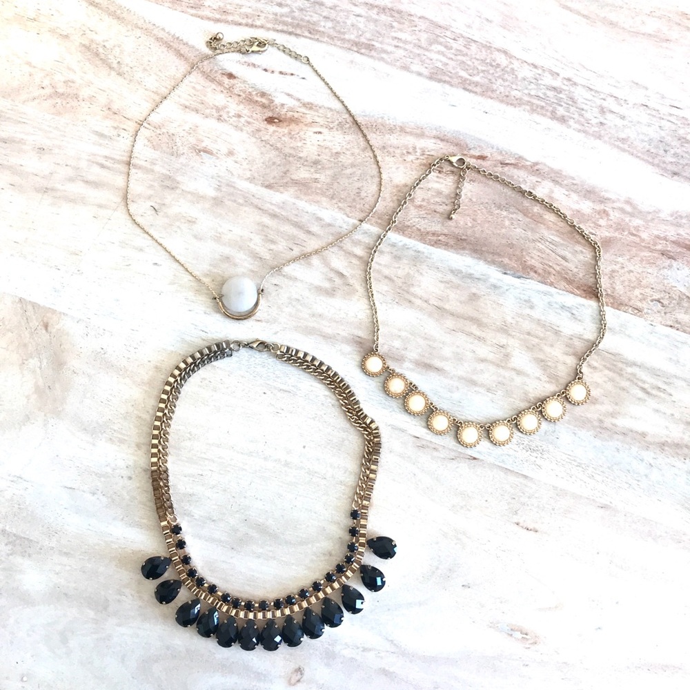Lot of 3 costume jewelry necklaces. Black & white